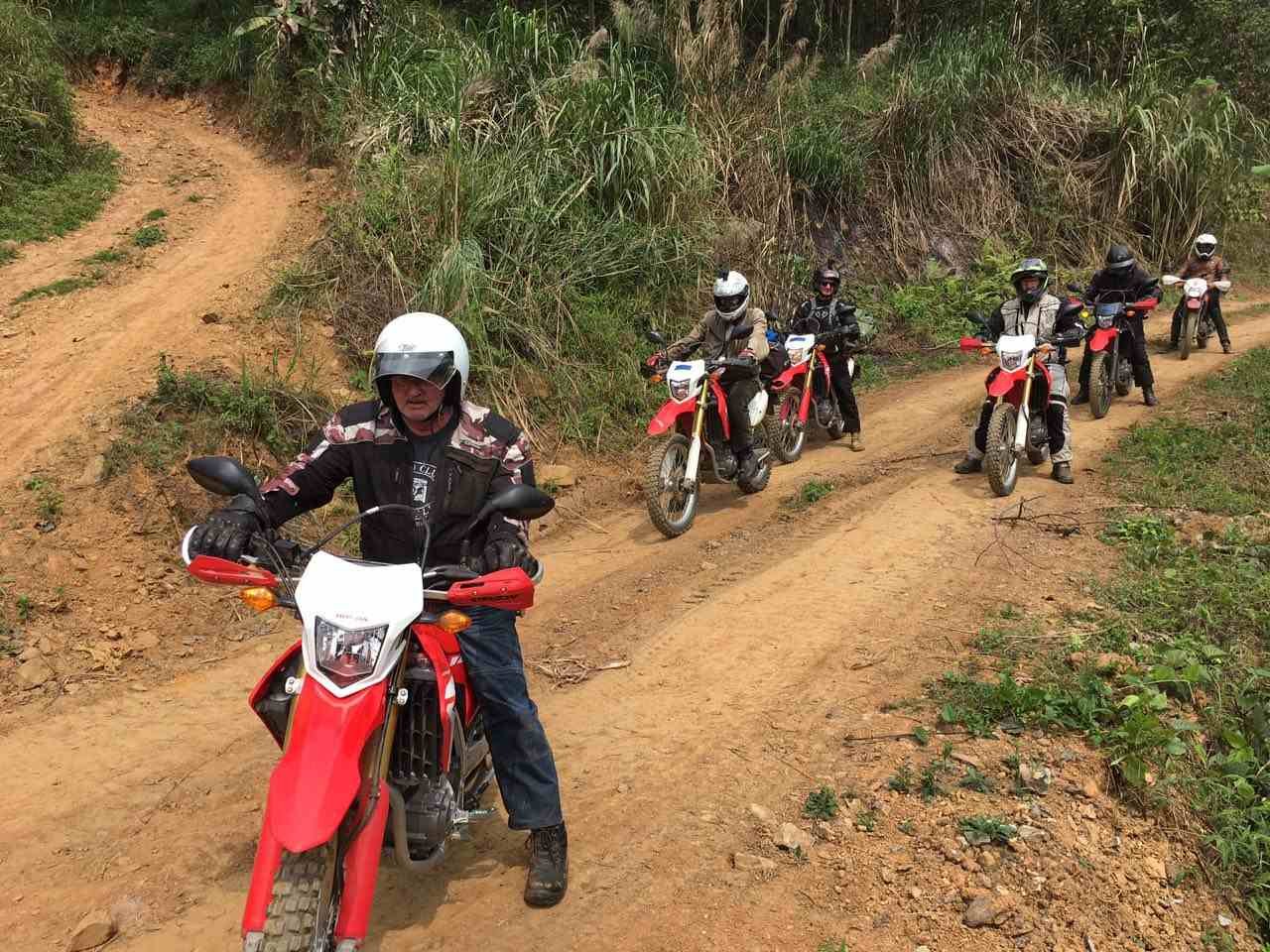 What necessary travel documents to prepare before going to Laos?